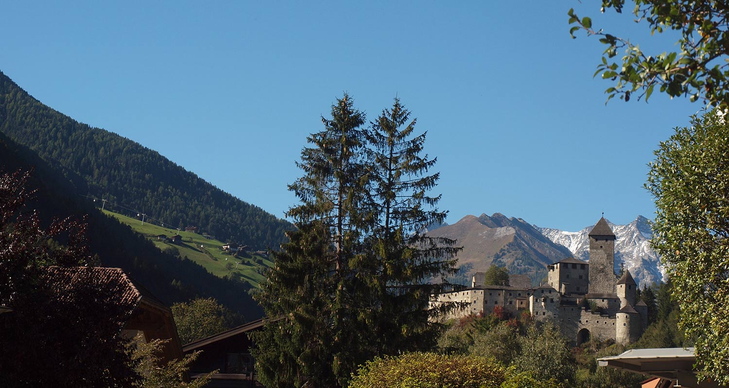 View of Antholz Castle in Kronplatz area on a summer day