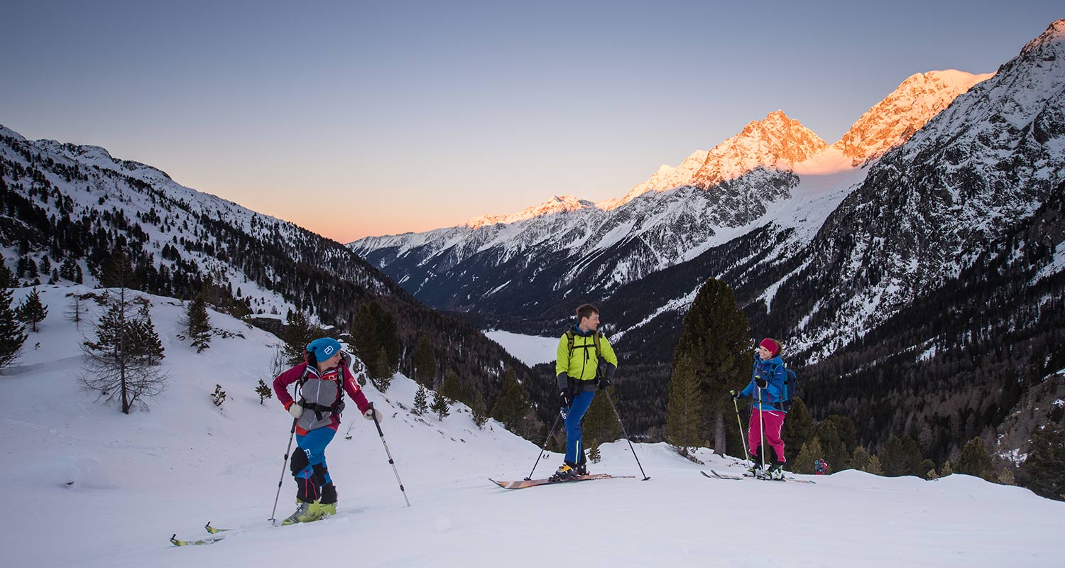 Three young people during a ski-hike